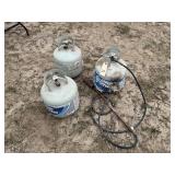 (3) 15 LB PROPANE BOTTLES AND PEAR BURNER