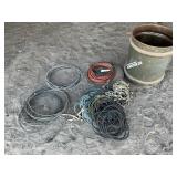 DRUM FULL OF ROPE WIRE AND EXTENSION CORDS