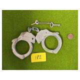 VINTAGE METAL HANDCUFFS W/ KEY
