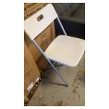 Four brand new folding chairs