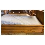 Twin size bed made out of Ash lumber with drawers