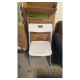 4 brand new folding chairs