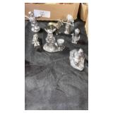Seven pieces of Peter figurines