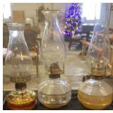 Three oil lamps