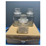Glass canisters with lids. Set of 3.