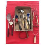 Assorted vintage kitchen utensils