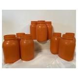 9 orange painted Ball jars