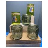 Assorted green floral containers.
