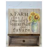 A country farm and family wall hanging
