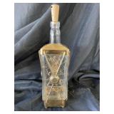 Vintage lighted, musical whiskey bottle