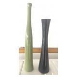 2 tall bottles/vases 1 green 1 black