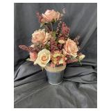 Silk flower arrangement. .