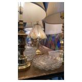 Three brass lamps