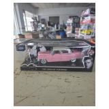 1955 Cadillac Fleetwood & Elvis Presley Figurine