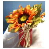 New orange sunflower in red jar