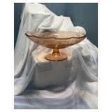Pink  glass pedestal bowl.