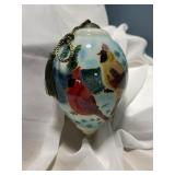 Hand painted glass ornament.