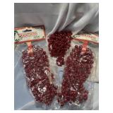 3 strings of red garland.