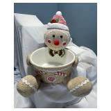 Gingerbread man with plastic dish