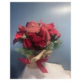 Silk red poinsettia wrapped in burlap