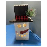 Wooden lighted snowman