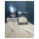 Two silver metallic cubes 4 1/2 inches tall 4 x4'