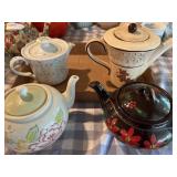 4 teapots