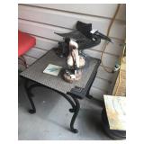 2 pelicans and metal stand