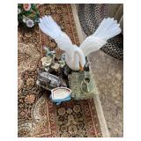 figurines and a candle holder