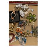 Flat of costume jewelry