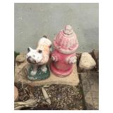 cement dog peeing on hydrant