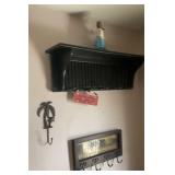 Contents of wall by entry door