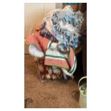 Stack of blankets, quilts and throws