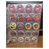 10 pages of pogs bottle cap
