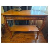 vintage oak library table featuring a carved