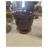 Ceramic planter with attached saucer