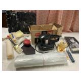 Drop cloth and paint supplies