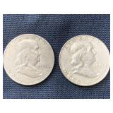 Two silver Franklin half dollars