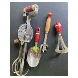 Red, wood handled utensils