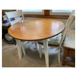 Round Wood drop leaf table with two chairs