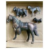 Bronze horses lane one has a broken leg