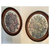 Two oval pictures