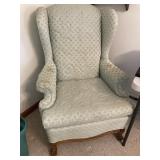 Light green wing back chair