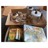 Crayons and toy tea set