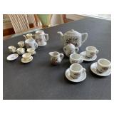 2 Childs tea sets  one plastic one ceramic