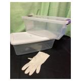 Two empty totes and a glove