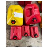 (2) 1 Gallon Gas Can, (1) 5 Gallon Gas Can, & (1) 5 Gallon Diesel Can