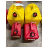 (2) 5 Gallon Diesel Can, (1) 1 Gallon Gas Can, & (1) 2 Gallon Gas Can