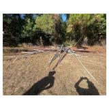 Various Irrigation Parts - Angle Iron, Pipe, Bracing Rods, Hard Hose Reel, Sheet Metal, Red Iron, Red Iron Poles, Fittings, Used Motors, Camper, Used Hoses with Sprinklers & Weights, & Motor