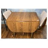 Drop Leaf Table and (2) Padded Rolling Chairs